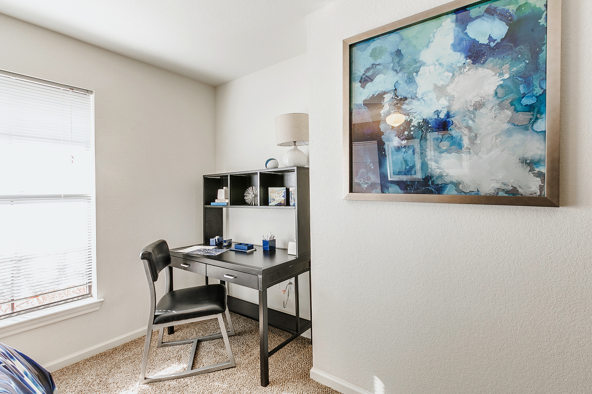 a desk and chair in a room