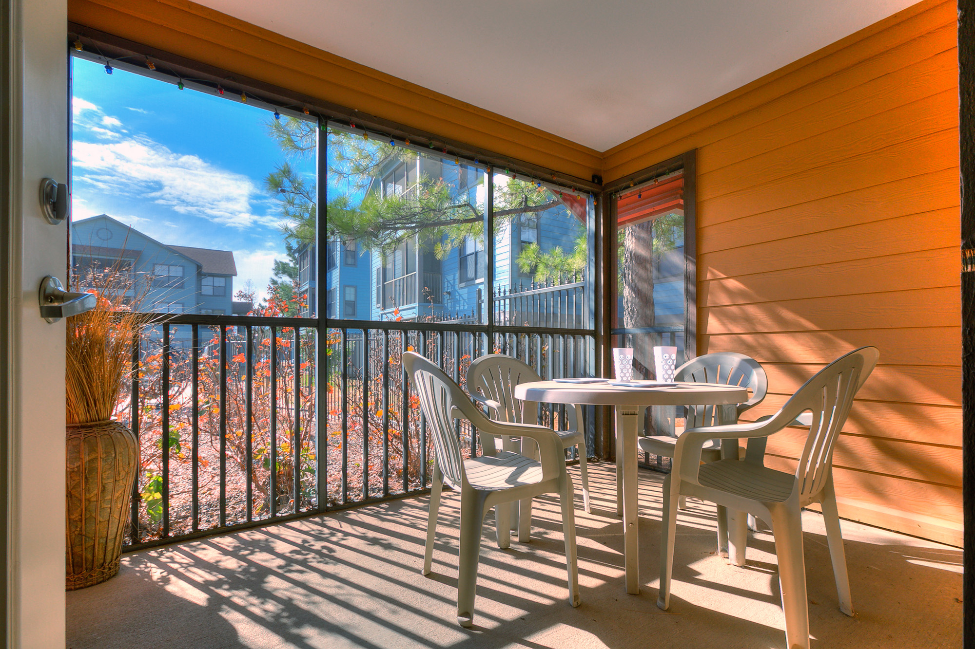 Porch with table and chairs